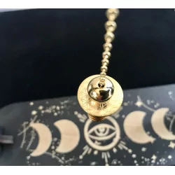 Pendule Fleur de Vie en laiton or.