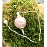 Pendule Quartz rose poli et métal.