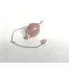 Pendule Quartz rose poli et métal.