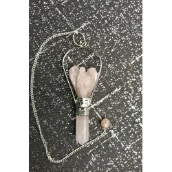 Pendule Ange Quartz rose.