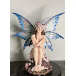 Fée nue avec des fleurs, 36...